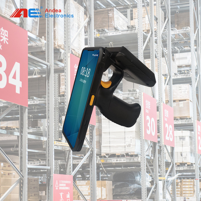 Il terminale tenuto in mano di inventario RFID di esame di stoccaggio sostiene le comunicazioni multiple e l'analizzatore del QR Code e del codice a barre